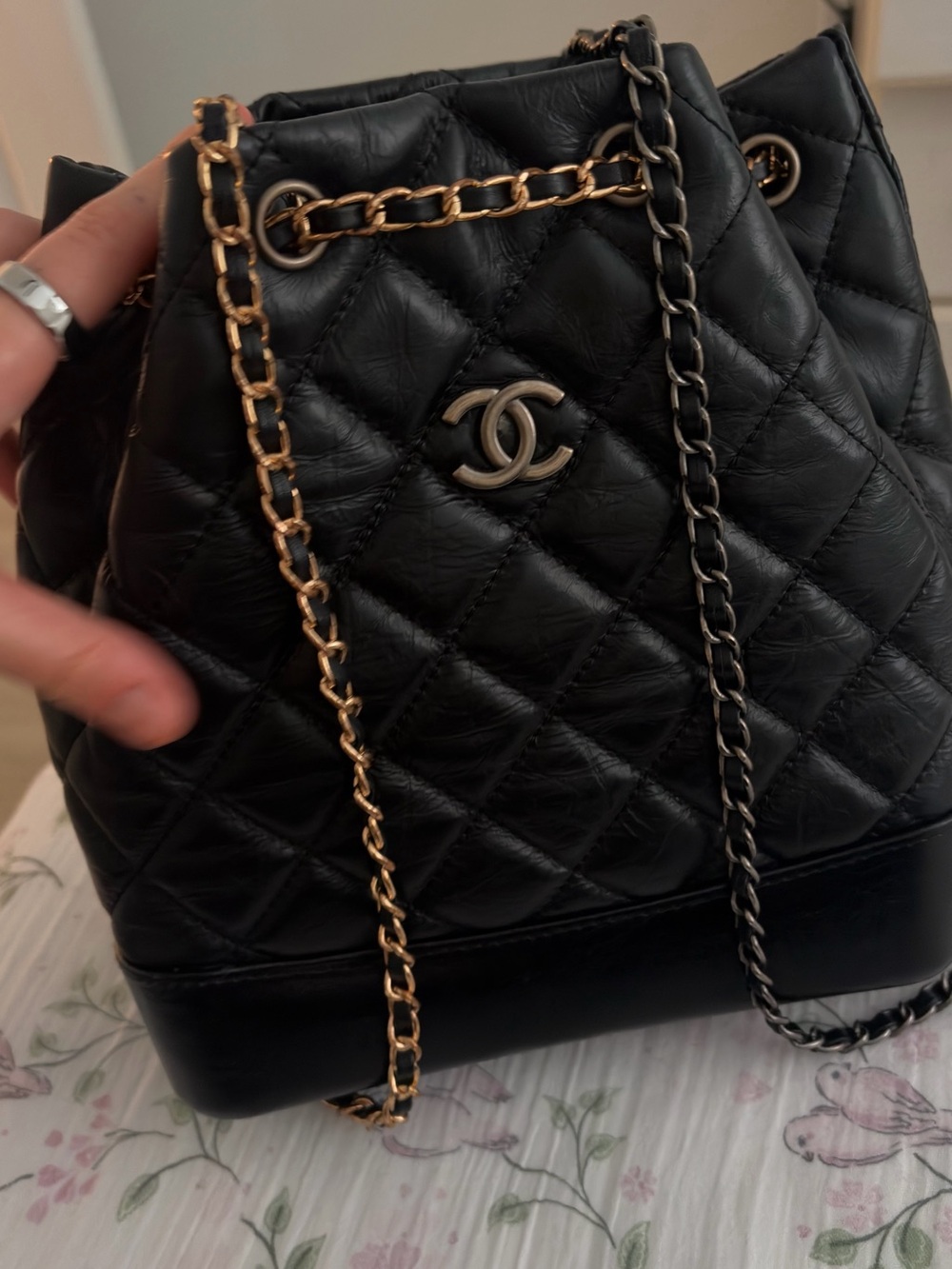 CHANEL Black Quilted Leather Drawstring Shoulder Bag with Gold & Silver Chain